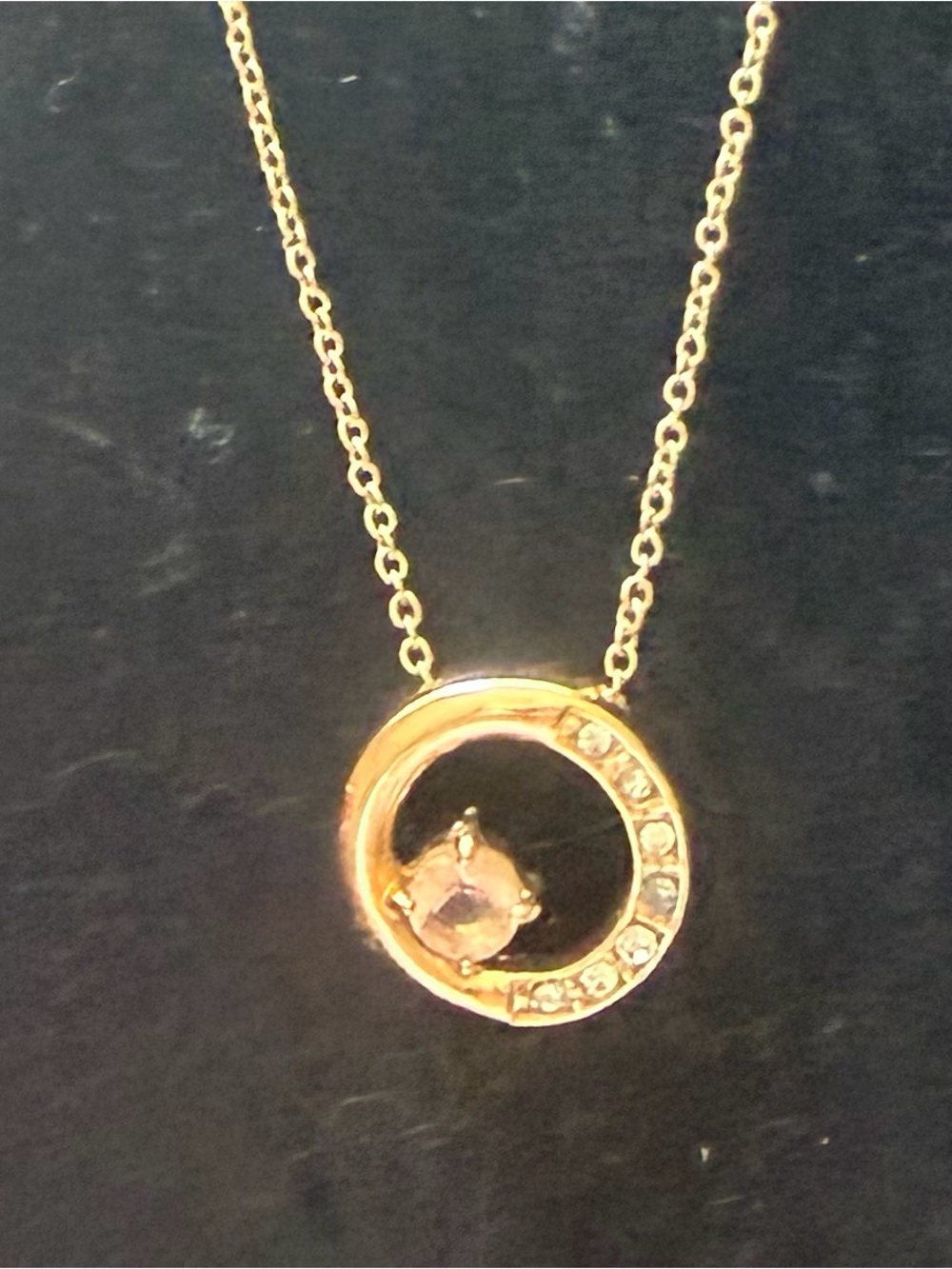 Gold-Tone Circle Pendant Necklace with Pink Center Stone
